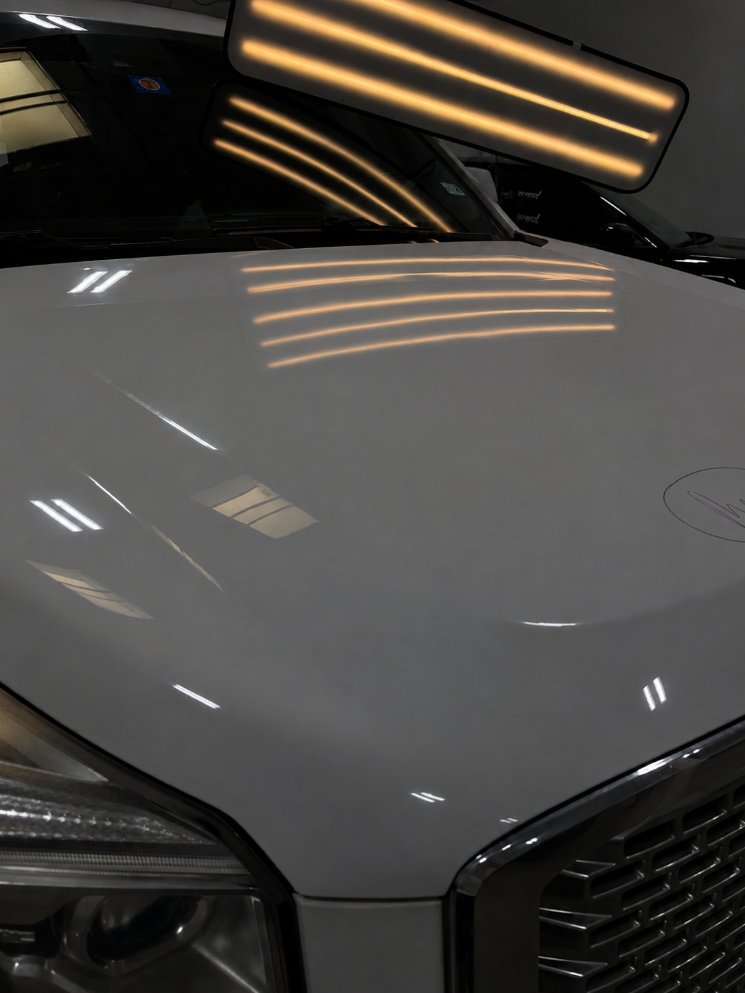 Pickup hood — moderate hail repaired with PDR — After